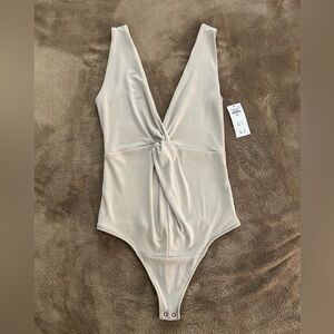 Abercrombie & Fitch Glossy Rib Plunge Twist Bodysuit Beige
